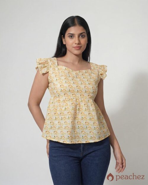 Printed ruffled trim peplum blouse